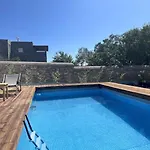 Minimal Cream Pool-front In Páros