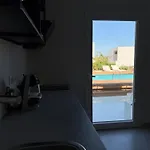 Minimal Cream Pool-front In Apartamento