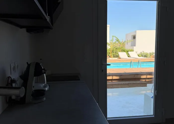 Minimal Cream Pool-front In Apartment